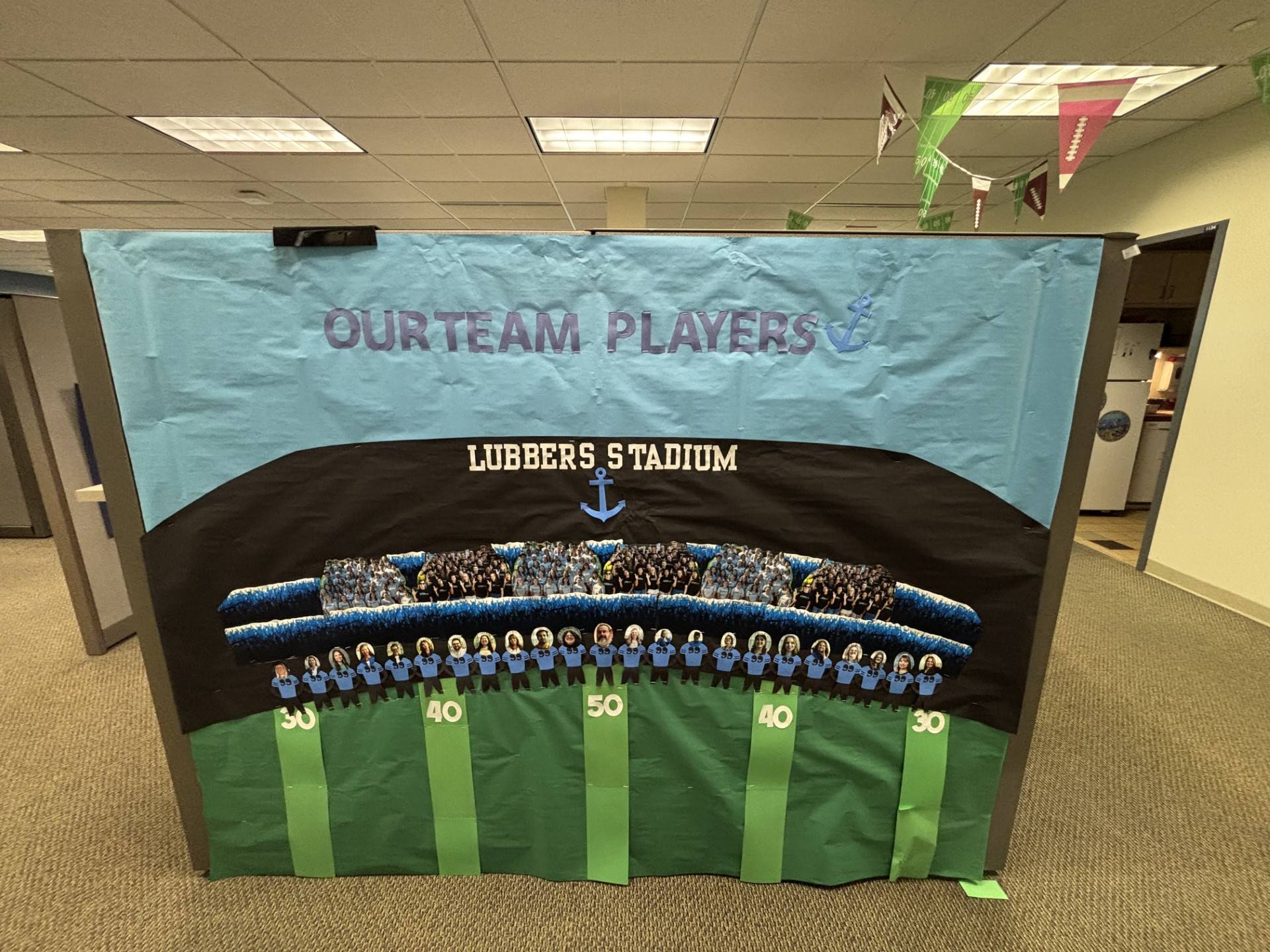 OSL Homecoming decorations showing Lubbers Stadium and their office team players